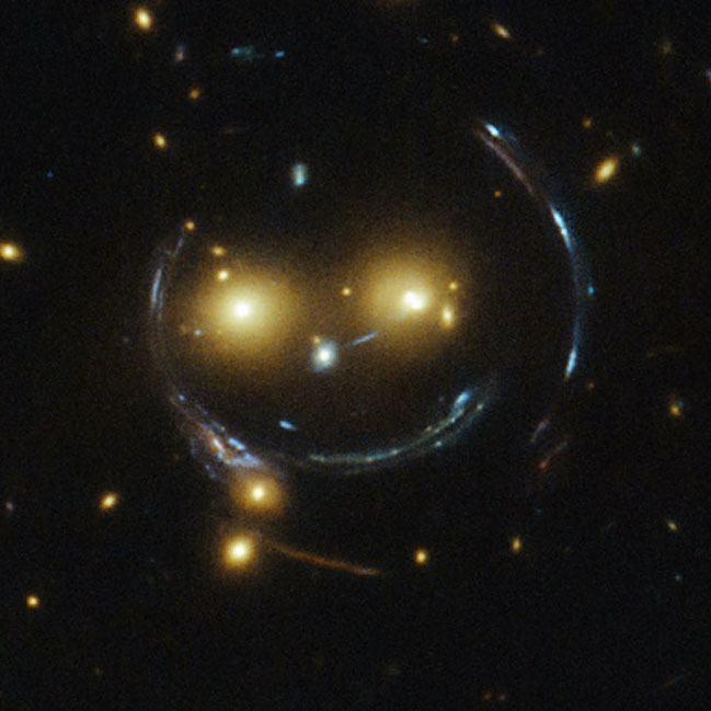 A smiling gravitational lens